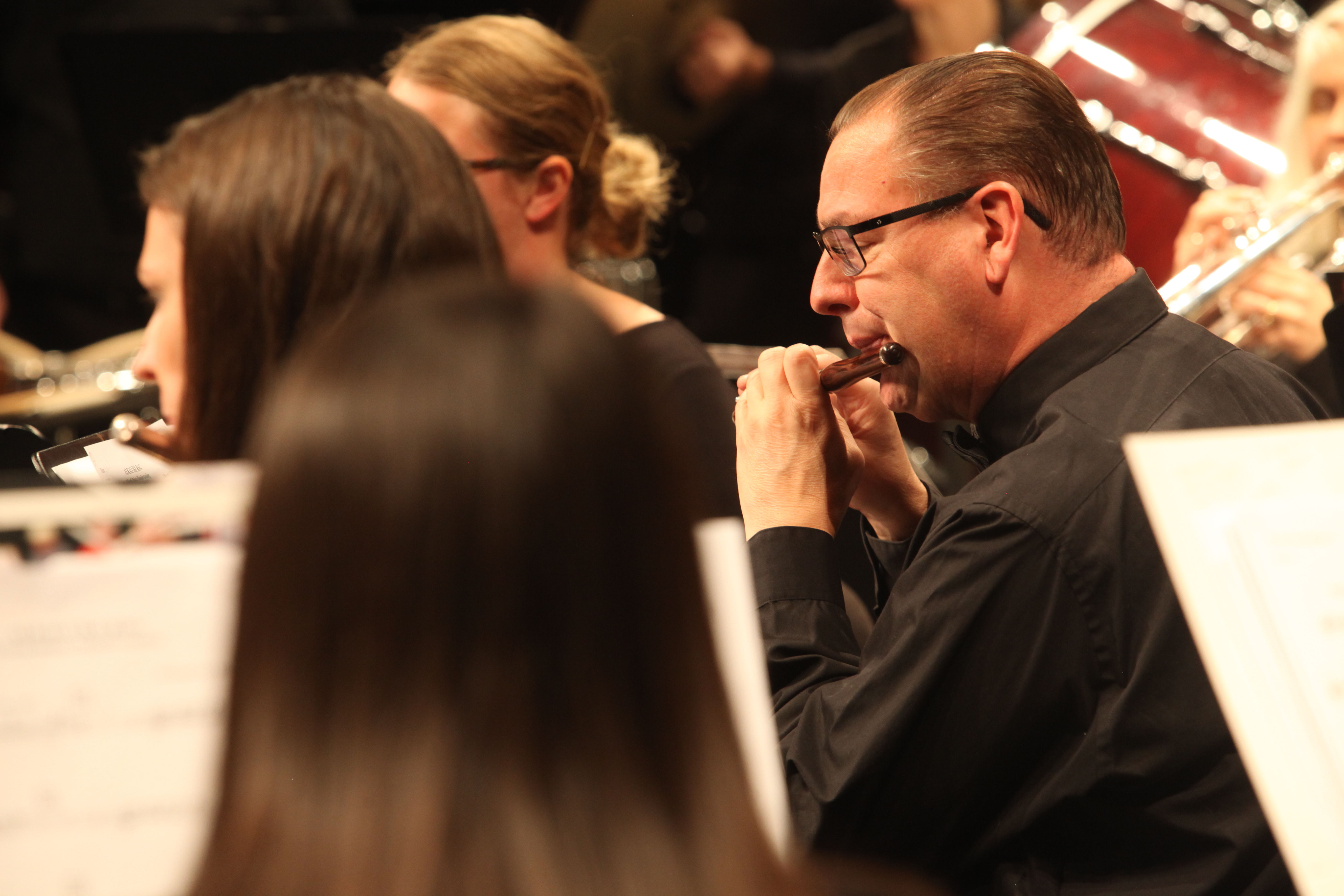 A Dearborn Community Concert Band piccolo player performing